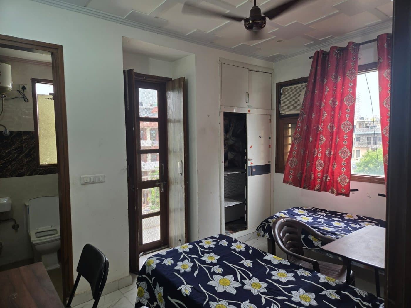 Bright room with a balcony and curtains