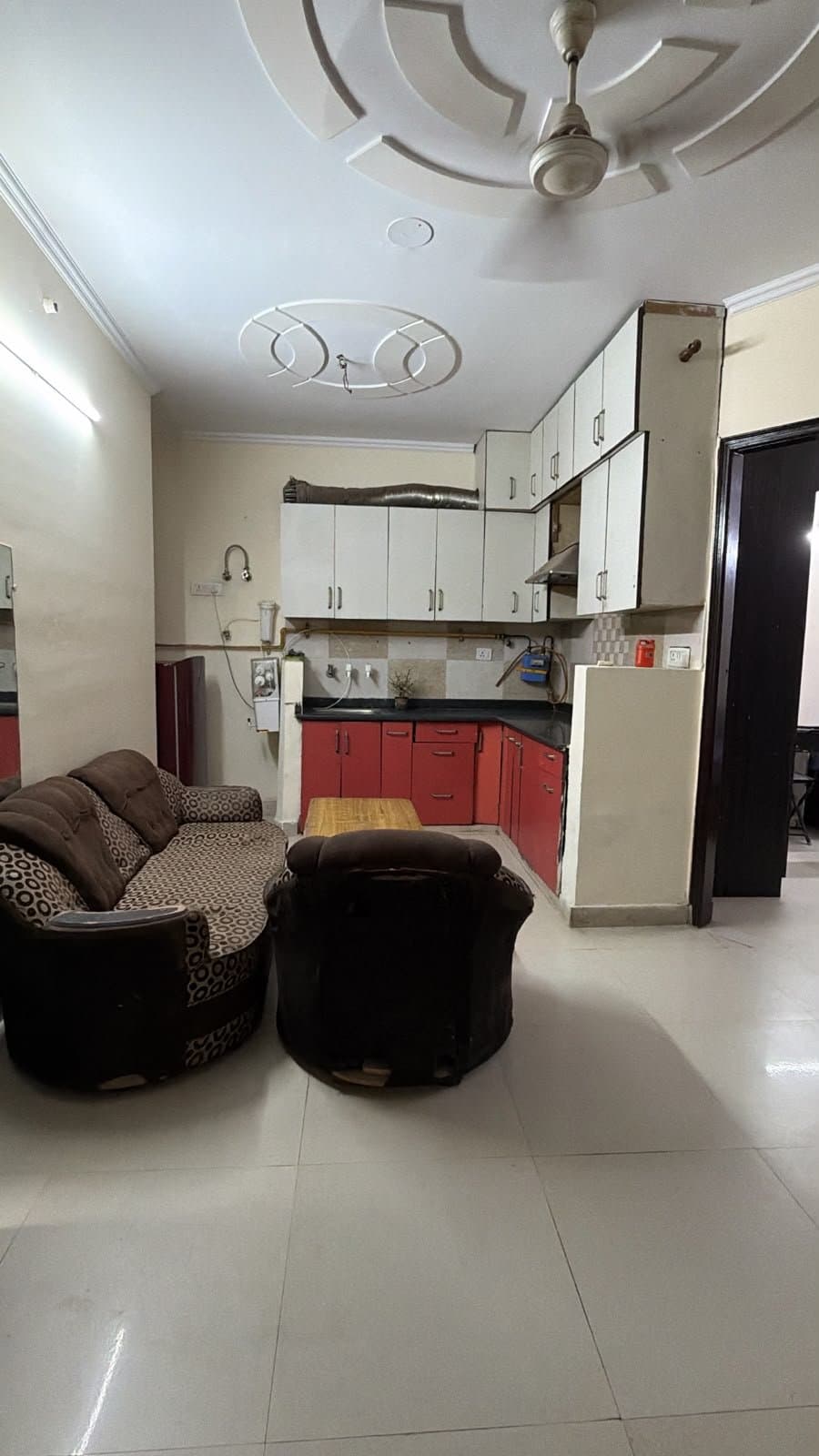 Common area and kitchen at Manvi Homes Stay PG where meals are served